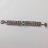Bracelet, Green Facet Bead surrounded by Crystal and Lavender beads.  Size 6-1/2"