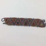 Triangle Weave, Glass Seed Beads.  Gold tones. Button closure.