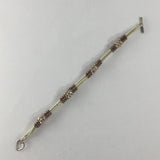 Bracelet, Silver and Copper Colored Glass Seed Beads in a Tubular Herringbone Pattern.  Size 7"