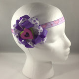 Stitched Headband for a baby age 6 - 12 mos.  Pretty Purple Ribbon Bow is on a hair-clip so it can be worn without the headband.