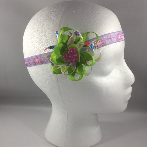 Stitched Headband for a baby age 3 - 6 mos.  Pretty Green Ribbon Bow is on a hair-clip so it can be worn without the headband.