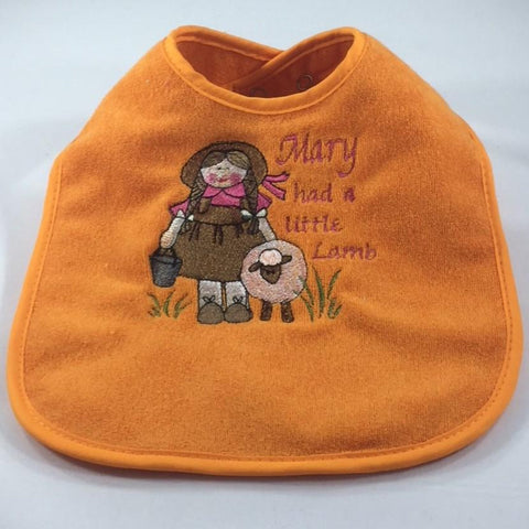 Embroidered Orange Baby Bib with /embroidered Little Mary and the words, "Mary had a little Lamb"