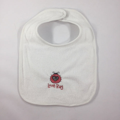 White Baby Bib Embroidered with a Red Lady Bug and the words "Love Bug"
