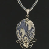 Necklace, Glass and Silver Seeds Beaded with Dolphin Pendant.  Necklace 22".  Sterling wire wrapped pendant is 2-1/4".