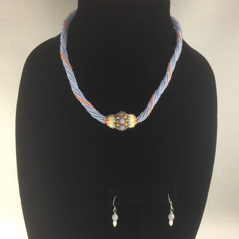 Light Blue and Orange Peyote Stitch Beaded Rope Necklace of Glass Seed Beads with a hand made bead with Czech Fire Polished Glass Beads, Rice Pearls and Glass Seed Beads.  Sterling clasp. Necklace length 16'".  Matching pair of earrings included.