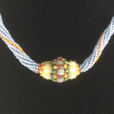 Light Blue hand beaded  peyote stitch rope necklace with a hand made bead and Sterling clasp, 16"