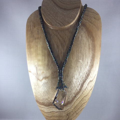 "Crystal Love"  Beautiful Large Swarovski Cosmic Pendant hanging from a hand beaded rope done in glass Delica beads,  Necklace 18" with 3" drop.  Matching earrings included.