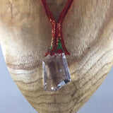 Necklace, Large Swarovski Cosmic Pendent hanging from hand beaded rope.