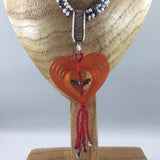 Necklace, Red, White and Black handed beaded rope.  Acrylic heart with Dragonfly.