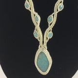 Necklace, Elegant Bead work encasing Turquoise pendant