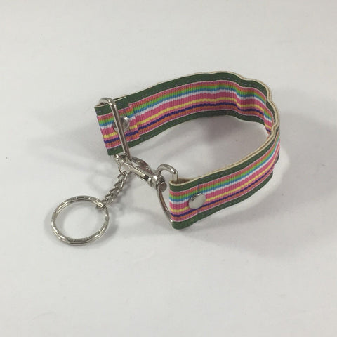Key fob with bright colored thin stripes.  Handmade by sisters2creations. Can wrap on wrist or hang on hook.