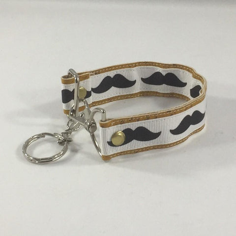 Accessory, Key Fob.  Mustache Print. Handmade by sisters2creations. Can wrap on wrist or hang on hook.