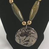 Necklace, Strung Large Ceramic Geometric shaped beads.  Gold tone.