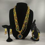 SET, Yellow Multiple strand necklace with hand beaded pendant.