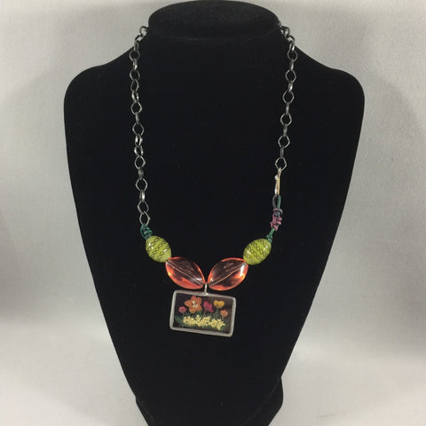 Gunmetal Chain Necklace with a Flower Glass Pendant.  Pink and green beads.  17"