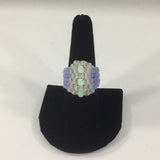 Beaded Ring, Translucent Glass Seed Beads. The Band is done with Opaque White, Green and Lavender Glass Seed Beads.  Size 9.  Although this ring was strung with Fireline, constant exposure to water is not recommended.