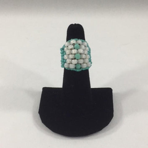 Turquoise and White Glass Seed Bead Ring.  Size 6 1/2.  Although this ring was strung with Fireline, constant water exposure while wearing is not recommended.