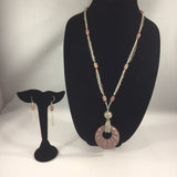 Rose Pink Donut Bead with Sterling Silver Chain.  Sterling Magnetic Closure.  Necklace is 28" around.  Earrings included.