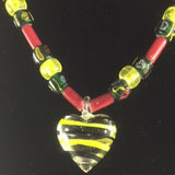 Necklace, Glass Red, Green, and Yellow Beads with a Lampwork Crystal Heart.  Length 18"