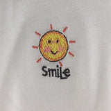 Baby Onsie for age 3-6mos.  Embroidered Sun and the word "Smile"