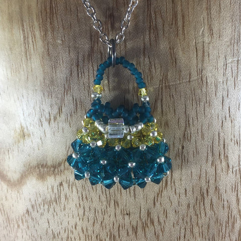 Hand Beaded Purse Pendant with Turquoise and Yellow Swarovski Crystals.