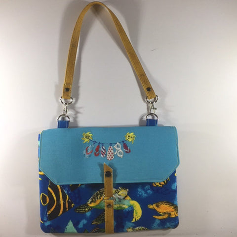 Tablet/IPad Case, Ocean Theme, Snap Closure, 2 Spare Pockets on Back.  Embroidered Flap.  Shoulder Strap.  Size H8" W10-6/8"