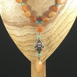 Necklace, Arizona Dreams,  Faceted Amber and turquoise beads. Sterling