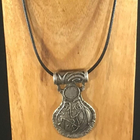 Pewter Cast Medallion on a 27" Leather cord. Sterling Silver magnetic clasp.