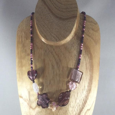 Strung Necklace with Amethyst and Pink Czech Fire Polished Glass Beads and Shades of Purple Lampwork Beads.  Necklace length 19".  Matching Earrings are included.