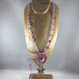Pink Beaded Necklace with a Pink Dragonfly suspended from a Donut Bead.  Necklace 22" with a 3-1/2" drop.  Side clasp.  Earrings included.