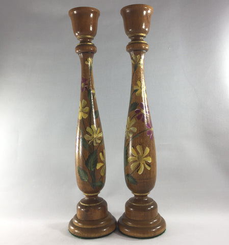 Candlestick, Walnut background with Yellow and Lavender Daisy's.  Hand painted on turned wood with 6 coats of gloss.  Gold ring detailing.  Brass candle holder ring and felt padded on bottom to prevent damage to furniture.  11" tall.