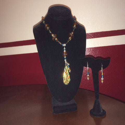 This necklace is full of Swarovskis (Topaz), Cathedral Ceiling Beads (Blue), and a Dichroic Pendant for work or a night oiut. Sterling. Earrings included.  Necklace 17" with 4" drop 