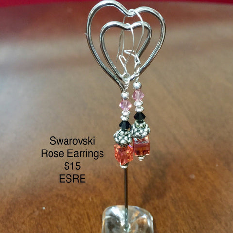 Pierced Sterling Silver Earrings with various Swarovski Crystals (Rose Cube,  Black and Pink Bicone).  Sterling findings and Sterling Silver French Ear Hooks.