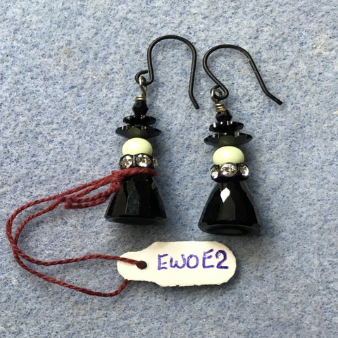Pierced Swarovski witch earrings.  Black Ear wires.