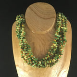 5 Strand Necklace with stabilized green stone chips and orange glass seed beads.  Earrings included.  Necklace length 18"