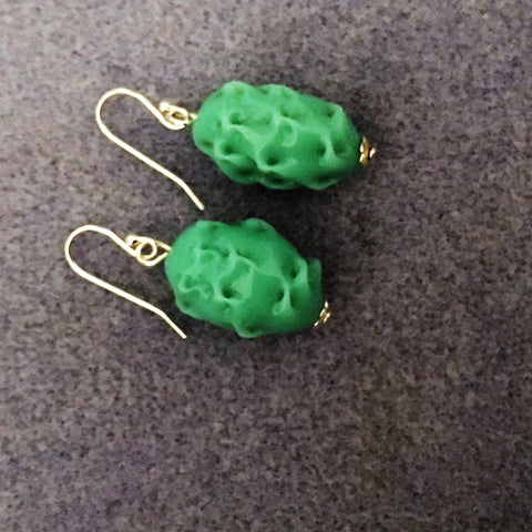 Green swirl bead earrings. Sterling Silver Ear Wires.
