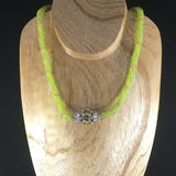 Green Hand Beaded Rope Necklace of Lime Green Glass Seed Beads with a hand made bead and Sterling clasp.  Matching Earrings included. Necklace 17 1/2"