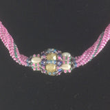 NEW, Pink hand beaded rope necklace with a hand made bead and Sterling clasp