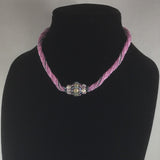 Pink Hand Beaded Rope Necklace of Pink Glass Seed Beads with a hand made bead with Czech Fire Polished Glass Beads, Rice Pearls and Glass Seed Beads.  Sterling clasp. Necklace length 16'"