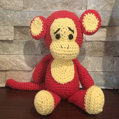 Crocheted and Stuffed Red Naughty Monkey with a Yellow Face. Cotton Yarn. 8" tall sitting.