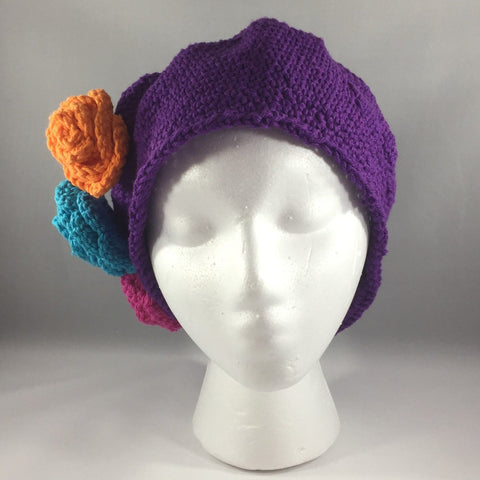 Crochet Hat,  Purple with Pink, Orange and Turquoise Flowers, Teen/Adult Extra Large.  Cotton Yarn.  Machine wash gentle cold.  Do not put in dryer.
