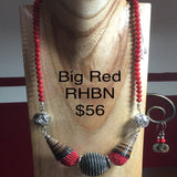 Chunky Red Beaded Necklace with Horn accents, red round beads and a large silver center bead.  Necklace 20".  Sterling Clasp and Ear Wires.  Earrings included.