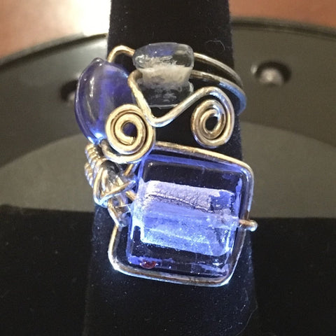 Sterling Wire Wrap, 1 Foil Blue Glass bead, and 2 additional blue glass beads.  Size 7 1/2