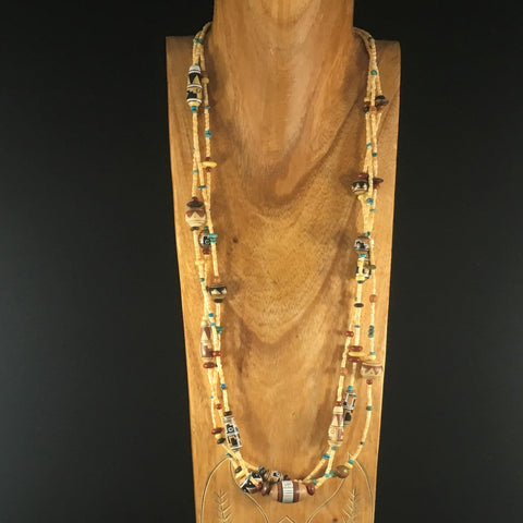 Treasures of the Sierra Madre Cocopah Necklace. Collection of hand painted Southwestern clay beads, red Jasper, wood, bone, Peruvian Indian clay, Arizona Turquoise, and melon shell heishi. 30". Sterling. Includes earrings.