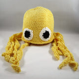 Crochet Hat, Yellow Octopus.  Cotton yarn.  Size newborn to 6mos.  Crocheted Amigurumi pattern. Machine wash gentle cold.  Do not put in dryer.